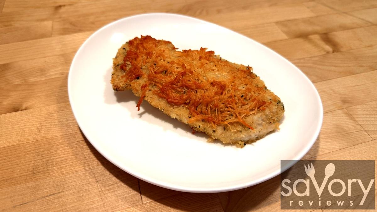 Crispy parmesan crusted chicken on a plate