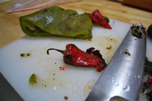 After steaming the peppers in a plastic ziptop bag you can easily peel them with the edge of a knife or even your fingers.