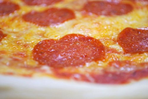 The cheese is golden and the pepperoni are glistening.  The perfect pie!!!
