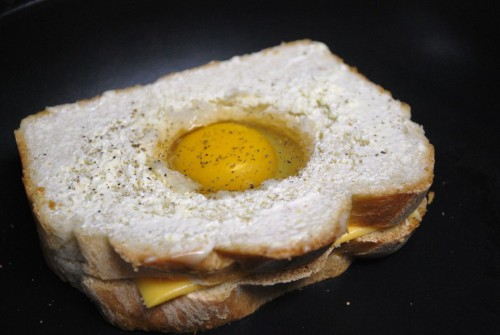 Once you have the egg in the hole make sure to season it with salt and pepper