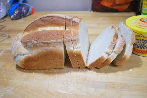 For stuffed sandwiches cut your bread about 1/2 in thick.  For unstuffed sandwiches cut your bread 3/4 to an inch thick.