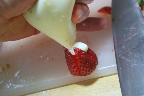 Filling the strawberries is pretty easy if you make a piping bag out of a ziplock.