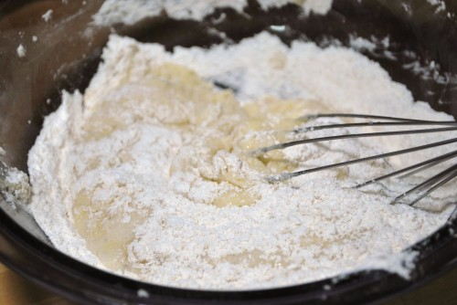 The mixture is way too thick for a whisk, so try a rubber spatula.