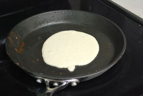 Pour the pancake onto the medium heat pan.  The bacon grease makes such a great crust on the pancake.  Amazing!