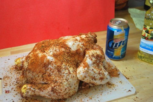 It is almost as if the chicken is wondering where the beer is going to go.