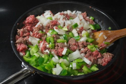 Add the veggies when the meat is almost browned