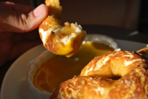 The pretzel dipped in a little Texas Sassy Mustard Sauce