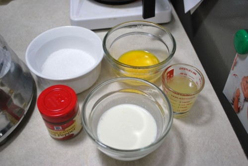 Mis en place - Top left to bottom right, salt, egg yolks, cayenne pepper, cream, lemon juice.