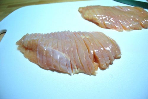 Slice the chicken into 1/4 inch strips