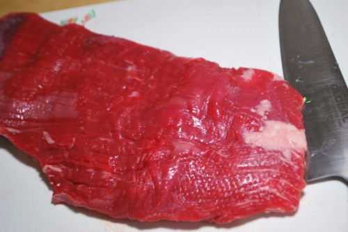 Trim the steak of any excess fat