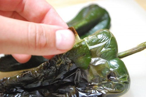 Peel the skin off the peppers revealing the bright green inside