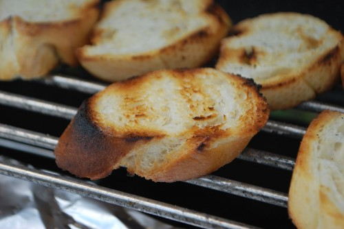 Grill the bread so it can soak up the beautiful broth