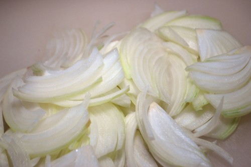 Slice the onion into long thin strips
