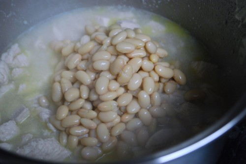 Add the beans without draining them