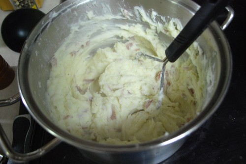 I whipped the potatoes with the hand masher.  They came out fantastic.