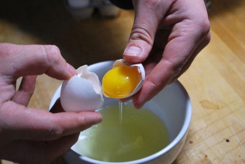 Separate the egg yolks, making sure to keep the whites