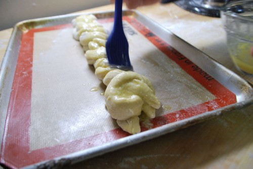 Coat the braids in garlic butter