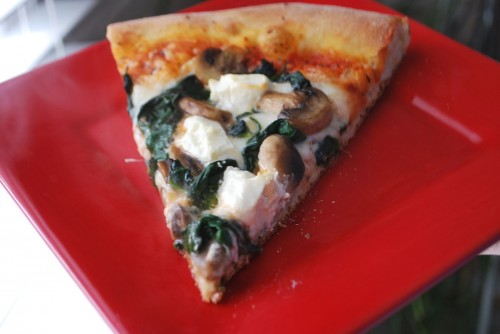 Spinach Musroom and Goat Cheese Pizza Slice