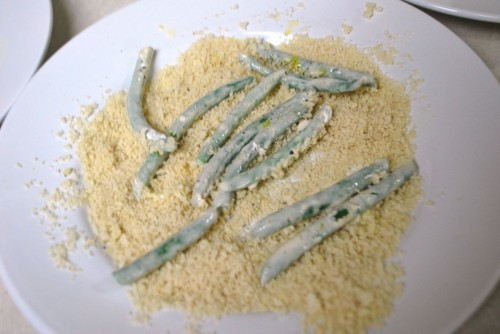 Cover the egg washed beans with the seasoned bread crumbs
