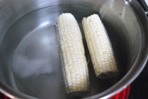 Add the corn to the salted water