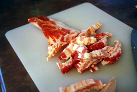 Cut the bacon into strips