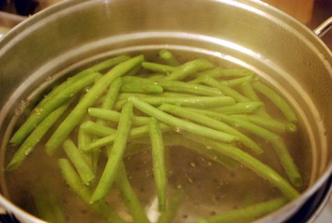 Quickly blanch the green beans