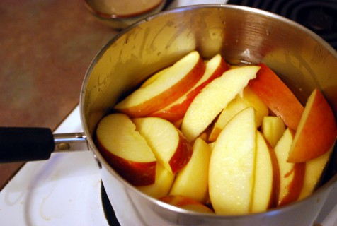 Slice the Apples and place into a pan with the apple juice