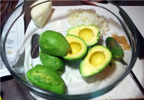 Toss the avocados with lime juice