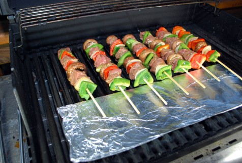 Use foil as a grill shield