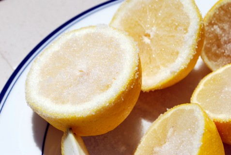 Coat the lemons with sugar