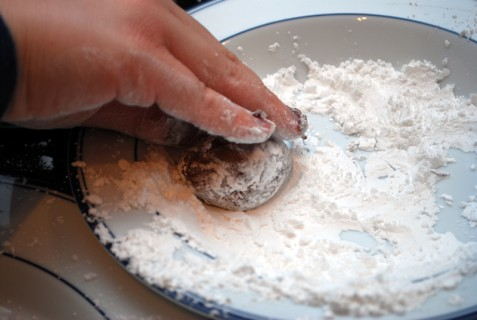 Roll in confectioners' sugar