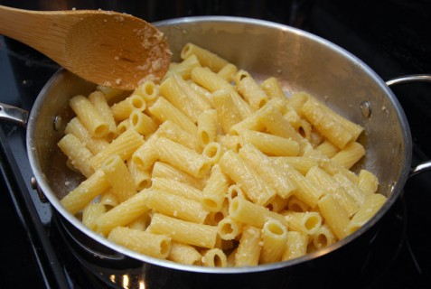 Butter the pasta and toss with cheese