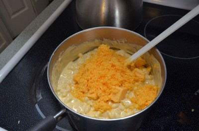Mix in the remaining cheese with the macaroni