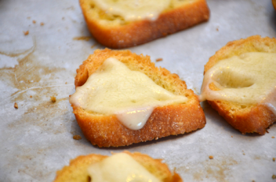 Melted cheese crostini