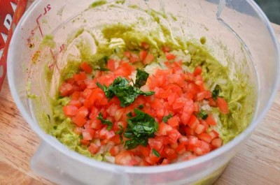 Add the tomatoes and cilantro