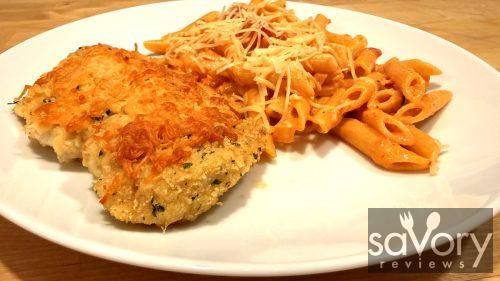 Easy parmesan crusted chicken served with penne vodka sauce - hero shot